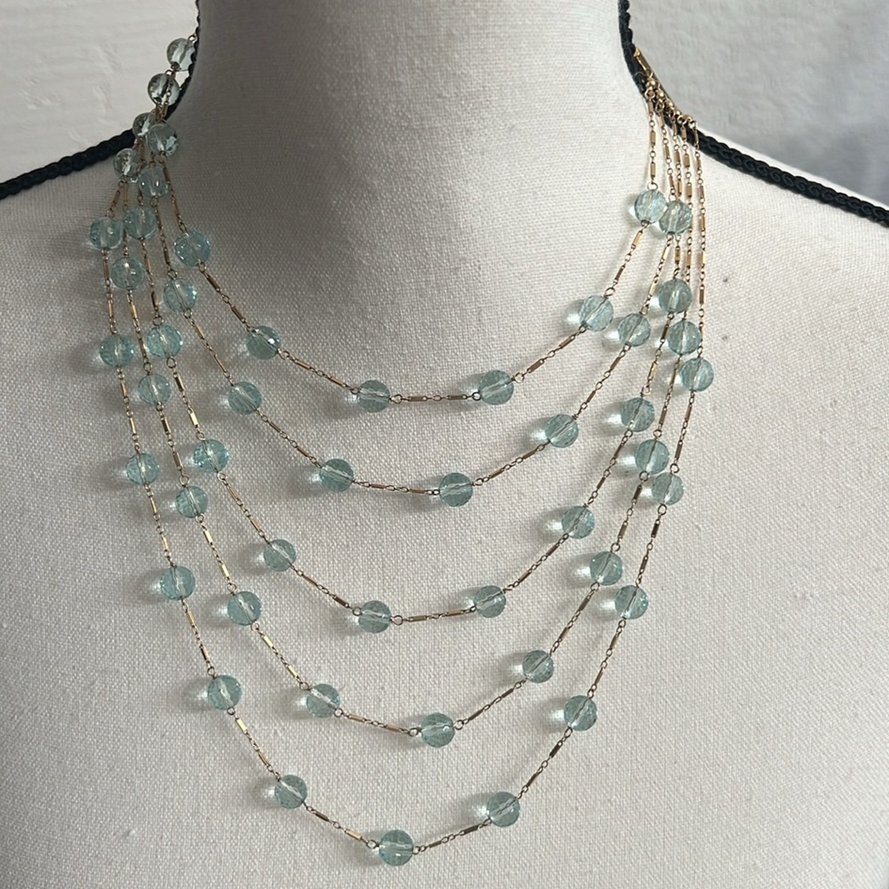 Solgoli 5 strand necklace with light blue faceted glass beads!